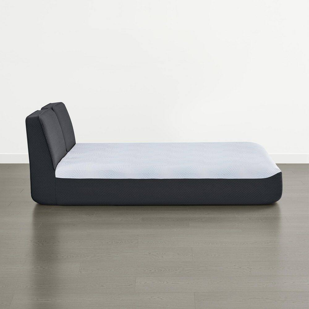 Side view of dark gray upholstered platform bed
