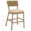 Bar stool with woven back and beige seat on white background.