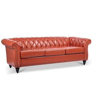 84.65 in Wide Rolled Arm Faux Leather Rectangle Chesterfield Sofa in Orange with Nail Head Trim, Button-Tufted Backrest