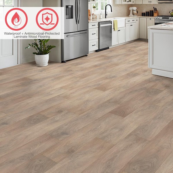 Outlast+ Desmond Oak 12 mm T x 7.4 in. W Waterproof Laminate Wood Flooring (19.63 sq.ft./case)