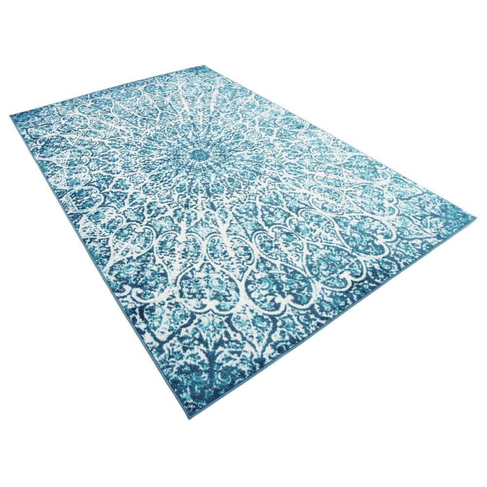 Turquoise and Ivory Geometric Synthetic Area Rug