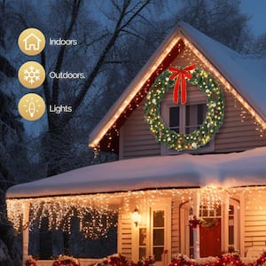 60 in. Pre-lit LED Artificial Christmas Garland with Red Bow