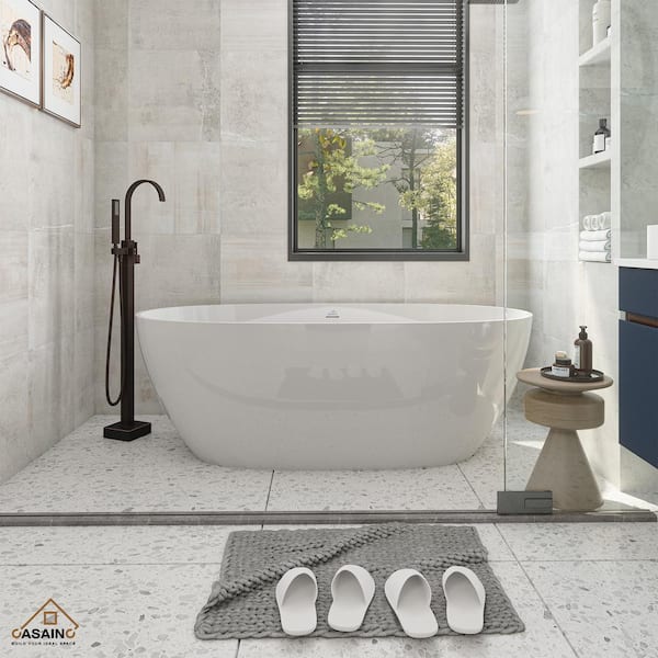 CASAINC 67 in. 31 in. Stone Resin Solid Surface Oval Soaking Bathtub in Glossy White with Standing Faucet in Oil Rubbed Bronze