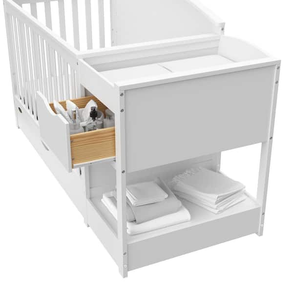 Cot with changer best sale