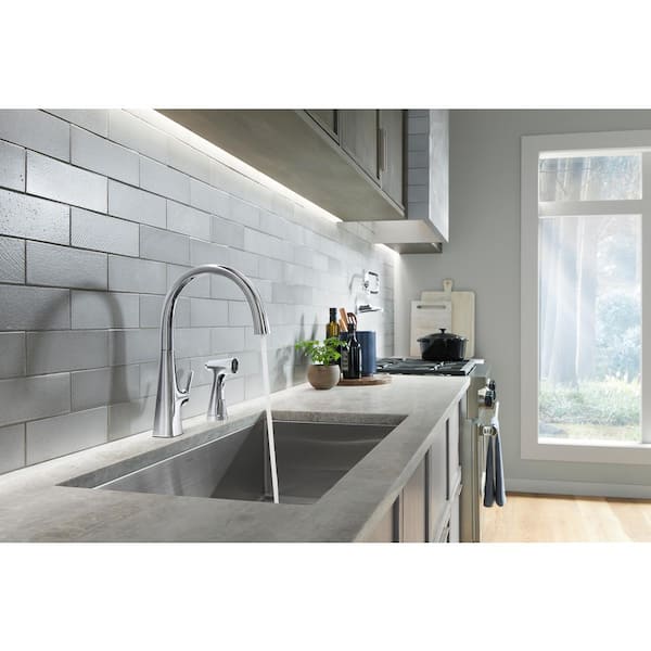 Graze Single Handle Standard Kitchen Faucet with Swing Spout and Sidespray in Polished Chrome