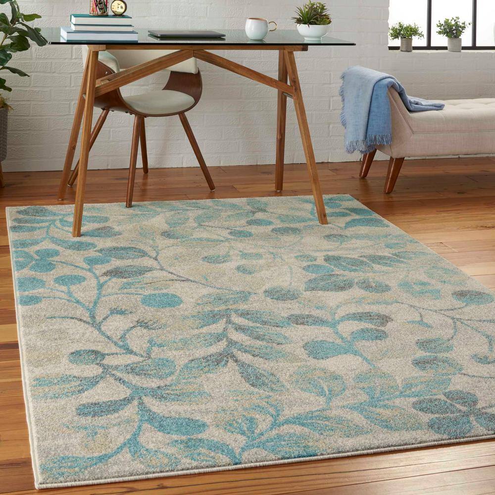 Ivory and Turquoise Floral Synthetic 4' x 6' Area Rug