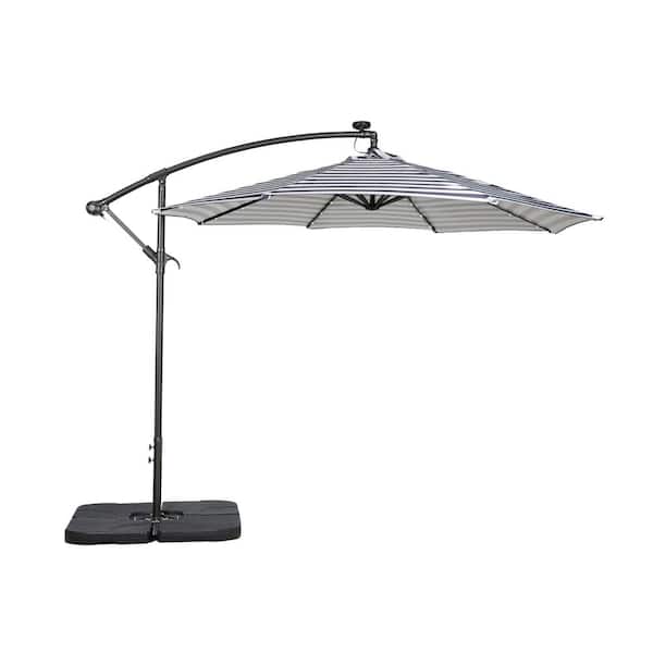 WESTIN OUTDOOR Bayshore 10 ft. Outdoor Patio Crank Lift LED Solar Powered Cantilever Umbrella with 4-Piece Base Weights, Black/White