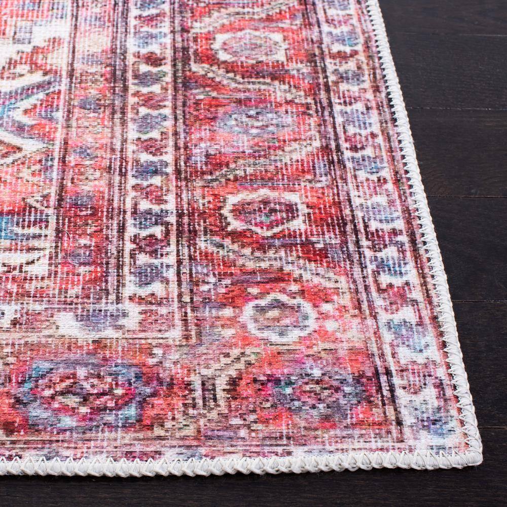 Serapi Red and Navy 6'7" x 9' Machine Washable Viscose Area Rug
