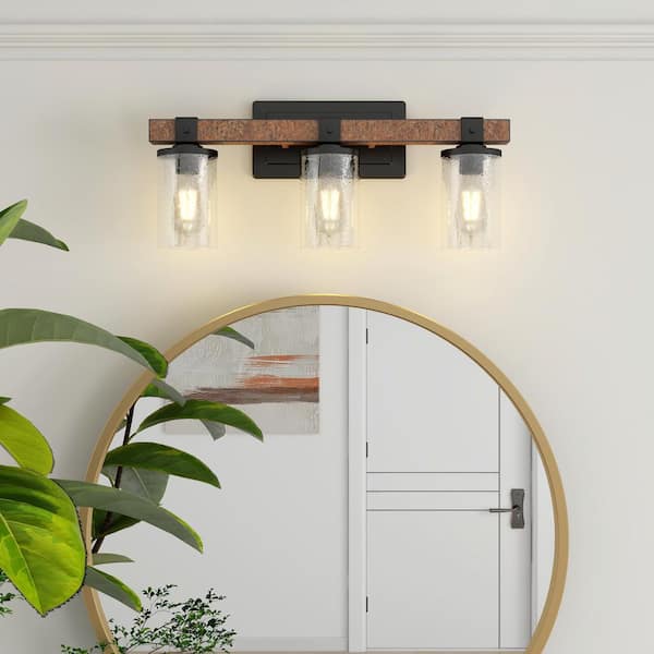 22 in. 3 Light Barn Wood and Matte Black Vanity Light with Clear Seeded Glass