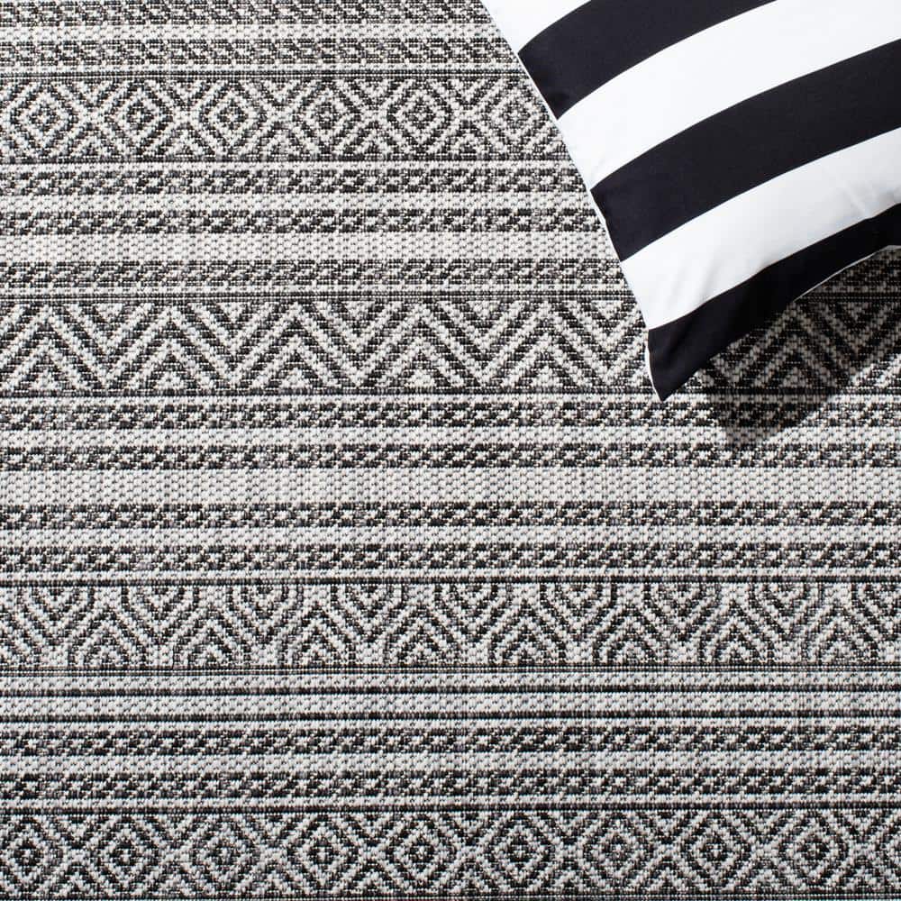 24" Black and Grey Synthetic Easy-Care Rectangular Rug