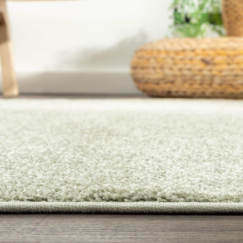 Haze Solid Green Low-Pile Synthetic Area Rug