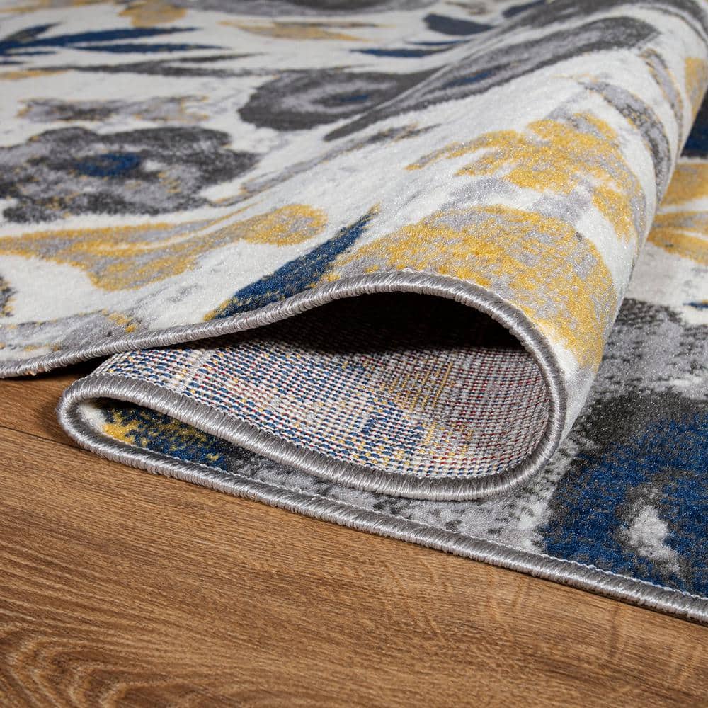 Ivory Floral Bliss 5' x 7' Easy-Care Synthetic Area Rug
