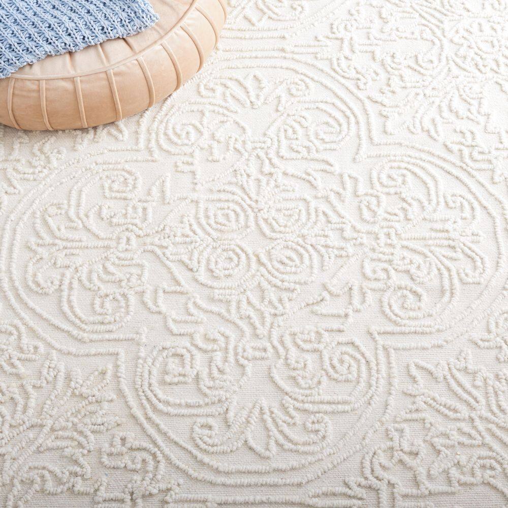 Ivory Hand-Tufted Wool and Synthetic 4' x 6' Area Rug