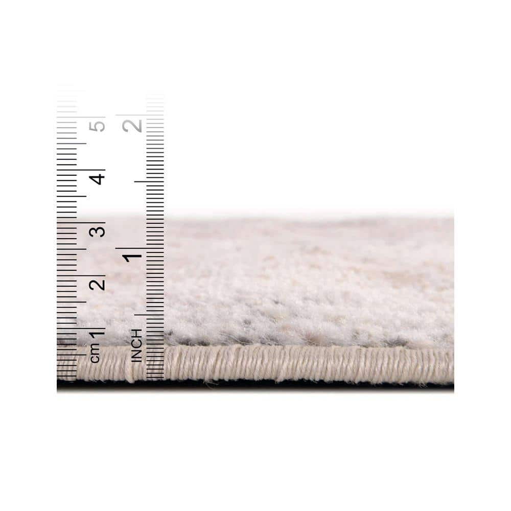 Ivory and Gray Geometric Synthetic 5'3" x 8' Area Rug