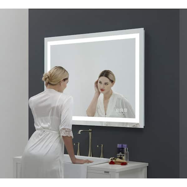 https://images.thdstatic.com/productImages/b22b6ad5-2cb7-40b2-ac0b-3859c44c92a5/svn/backlit-and-front-light-toolkiss-vanity-mirrors-tk19268-d4_600.jpg