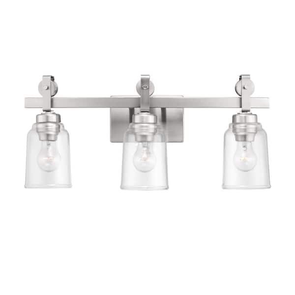 Home Decorators Collection Knollwood 22-3/4 in. 3-Light Brushed Nickel Industrial Vanity Light with Vintage Accents and Clear Glass Shades