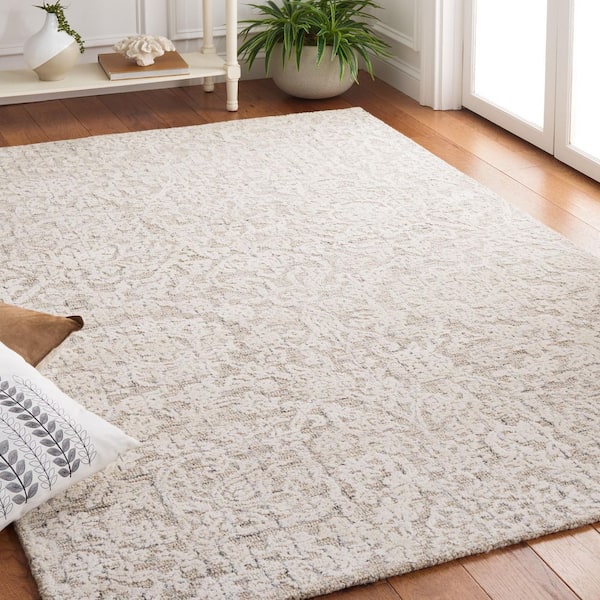 Metro 5 ft. x 8 ft. Beige/Ivory Distressed Marle Area Rug