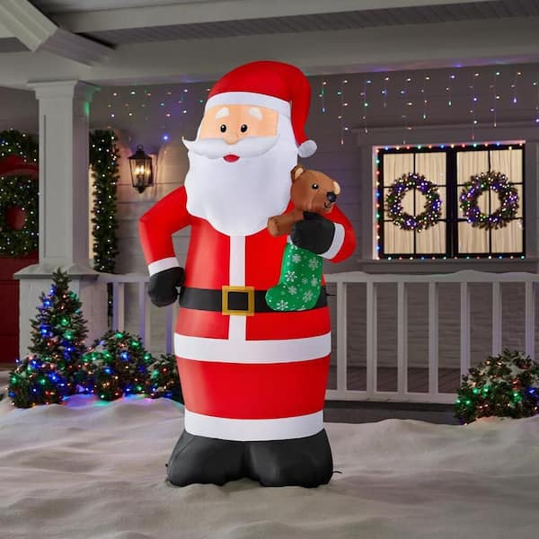 6.5 ft. H x 3.58 ft. W LED Airblown Holiday Lights Santa with Bear Stocking Christmas Inflatable