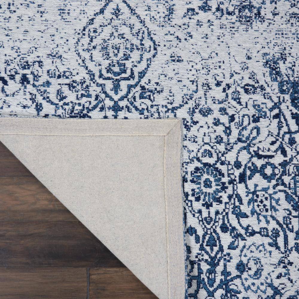 Ivory and Navy Medallion Synthetic 4' x 6' Area Rug