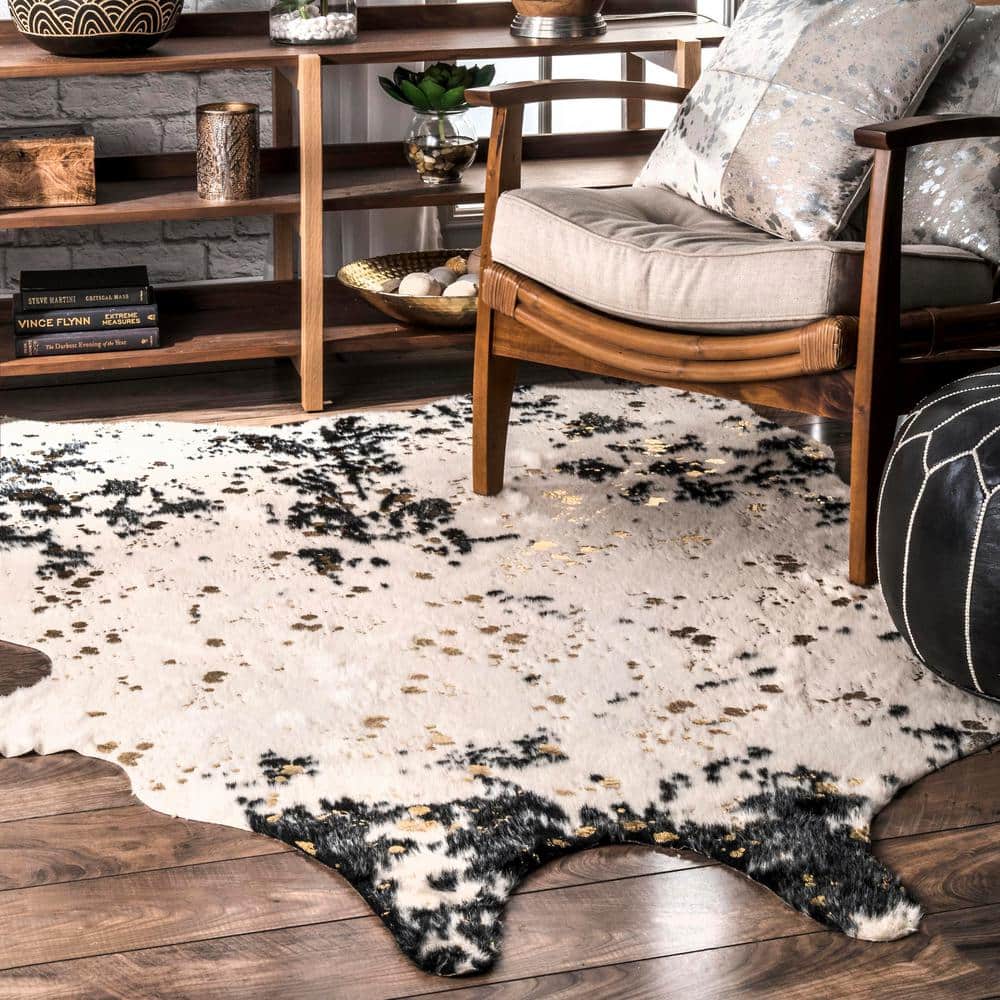 Black and Ivory Tufted Synthetic Cowhide Shaped Area Rug