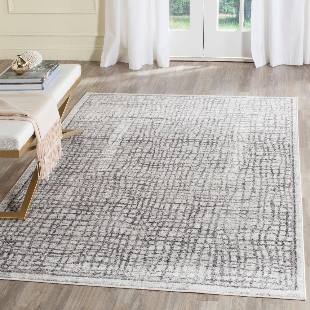 Ivory and Silver Rectangular Synthetic Area Rug, 4' x 6'