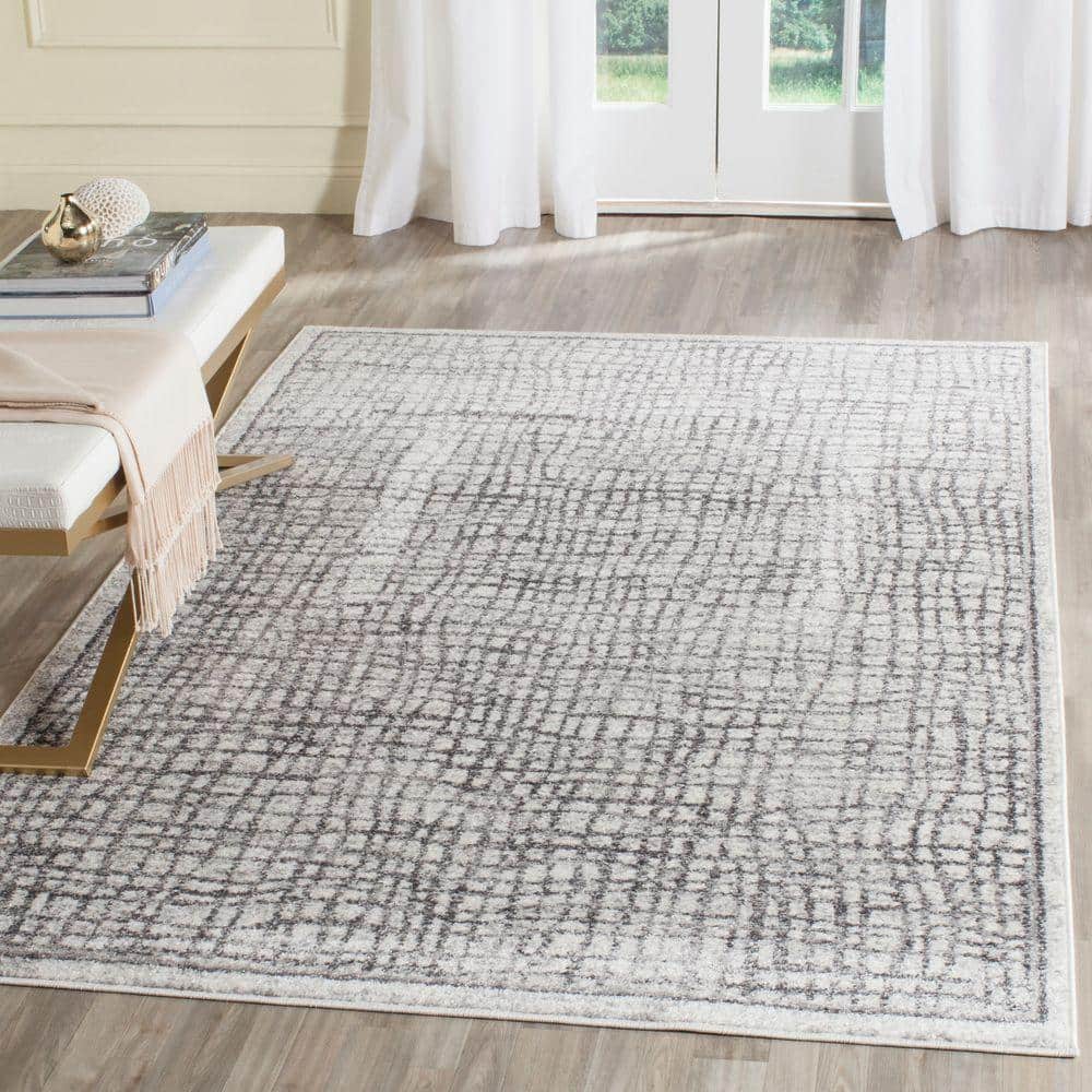 Ivory and Silver Rectangular Synthetic Area Rug, 6' x 9'