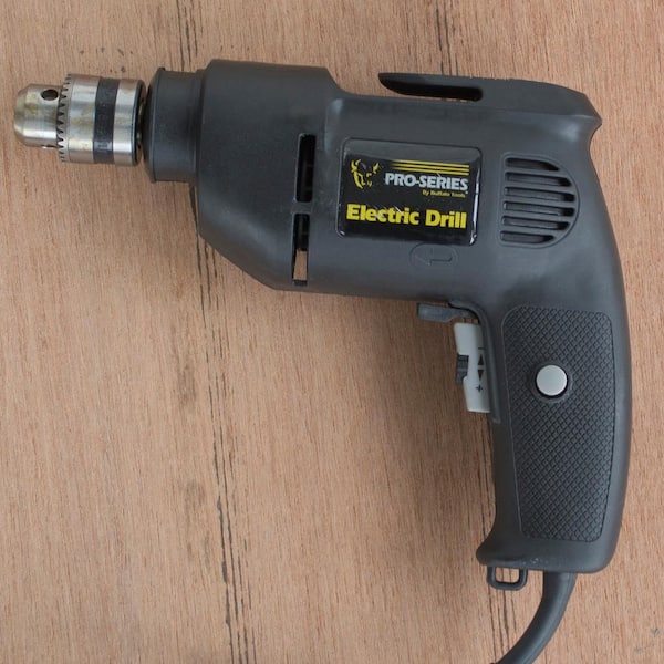 3.8 Amp Corded 3/8 in. Electric Power Drill with Variable Reversible Close Quarters Angle 3.8 Amp Corded 3/8 in. Electric Power Drill with Variable Reversible Close Quarters Angle