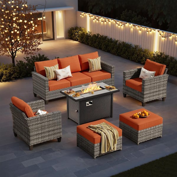 Camden Gray 7 Pieces Wicker Patio Conversation Set with 42 in. 50000 BTU Fire Pit Table, Orange Red Cushions and Ottoman
