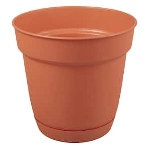 6 in. Bea Small Orange Resin Planter (6 in. D x 5.3 in. H) With Drainage Hole and Attached Saucer