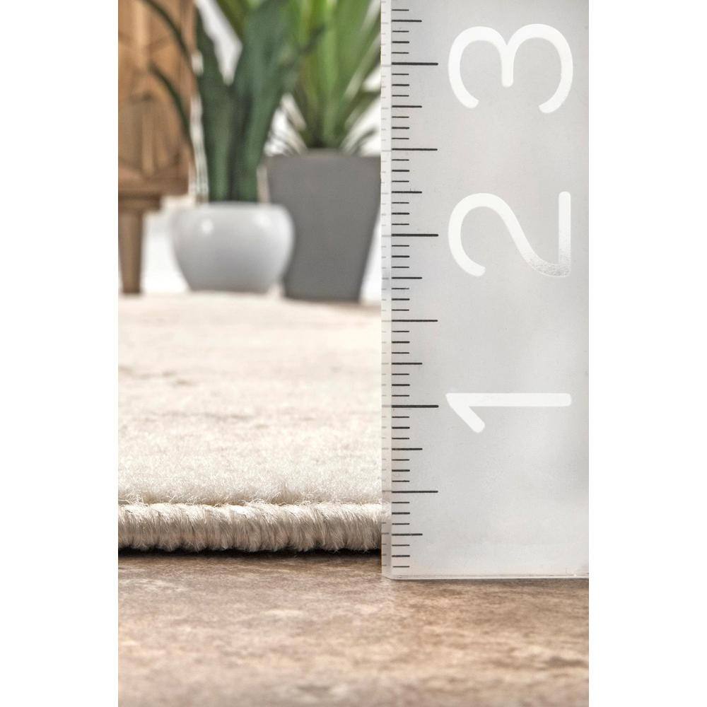 Beige Floral Synthetic Rectangular Area Rug 6' 7" x 9'