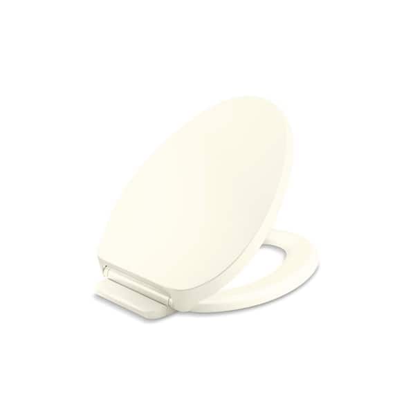 KOHLER Drift ReadyLatch Elongated QuietClose Front Toilet Seat in Biscuit 2800496 The Home Depot