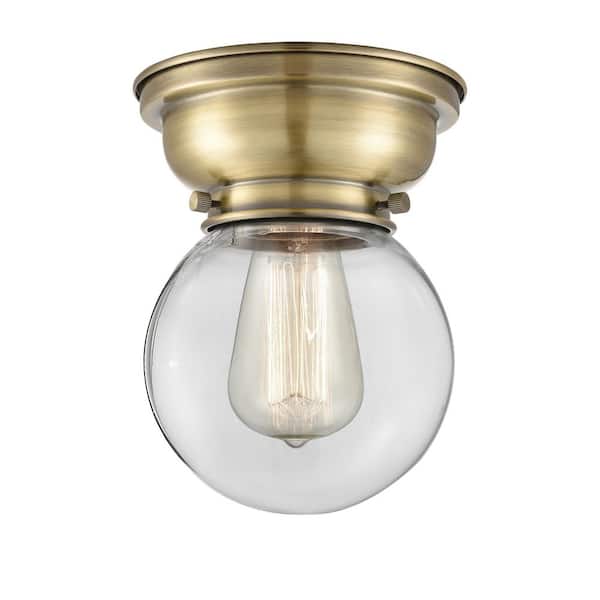 Beacon 6.25 in. 1-Light Antique Brass Industrial Flush Mount with Clear Glass Shade