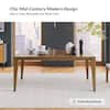 Mid-century modern dining table in a stylish room.