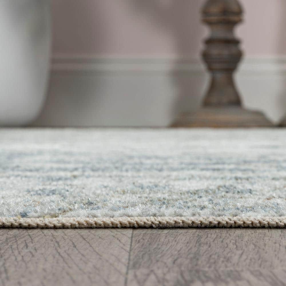 Pavel Light Gray and Blue Synthetic Medallion Washable Area Rug