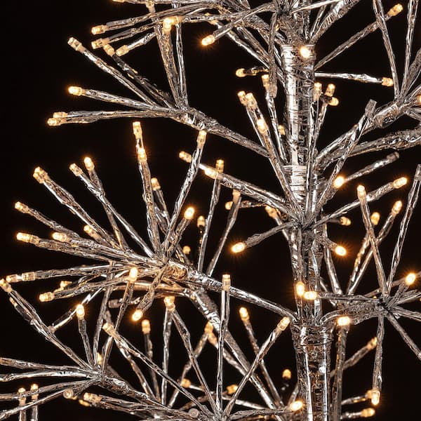 silver twig tree with lights