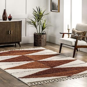 https://images.thdstatic.com/productImages/b2c431e7-6745-5094-a82a-f9f568a4dd23/svn/rust-nuloom-area-rugs-ozfg10a-508-64_300.jpg