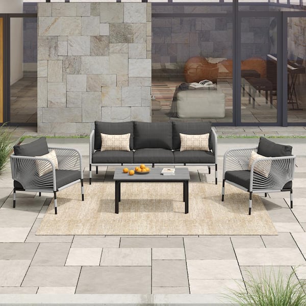 CORVUS Light Gray 4-piece Aluminum Wicker Patio Conversation Set with Gray Cushions and Sunbrella Pillows
