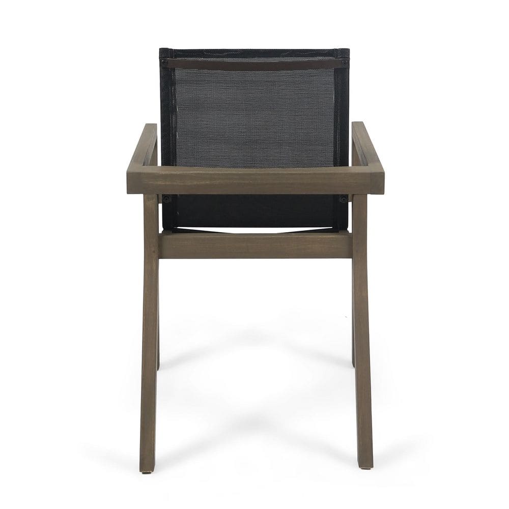 Grey acacia wood outdoor dining chair viewed from the back.