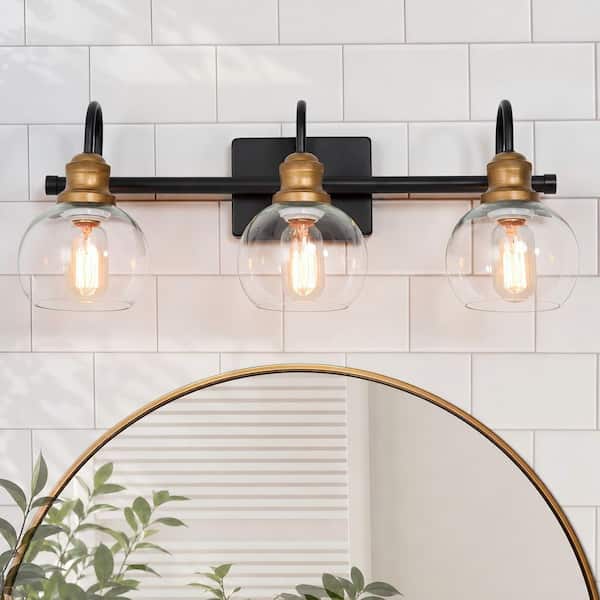 22.5 in. 3-Light Modern Aged Brass and Black Bathroom Vanity Light with Clear Glass Globe Shades Bathroom Sconce