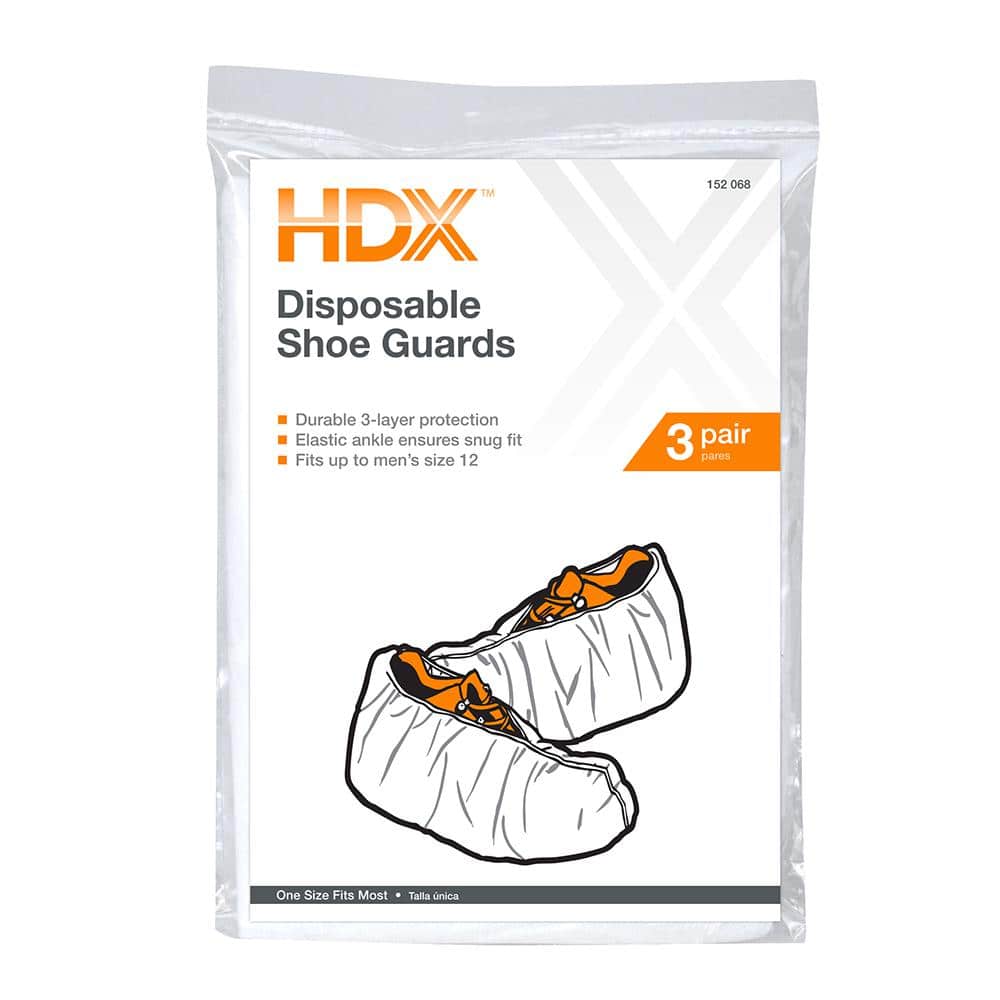white hdx disposable shoe covers 04603 64 1000