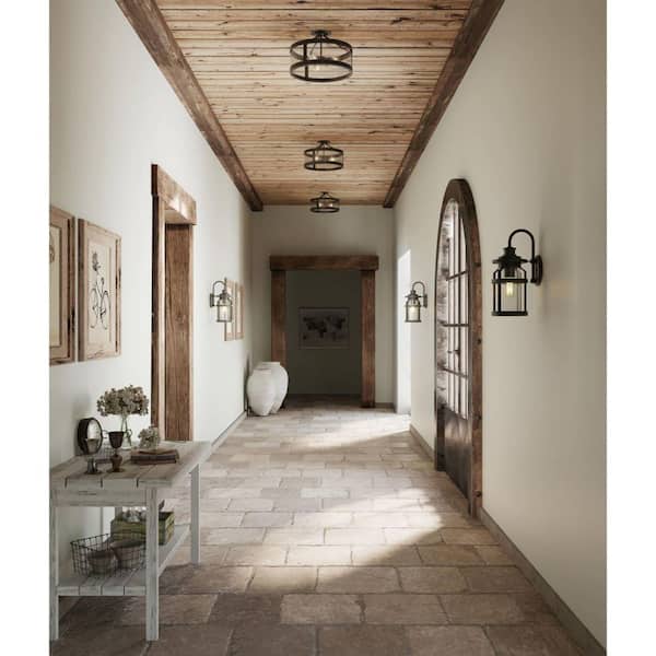 Haslett Collection 1-Light Textured Black Clear Seeded Glass Farmhouse Outdoor Medium Wall Lantern Light