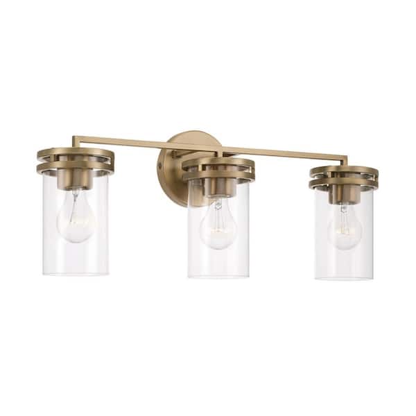 24 in. W x 9.75 in. H 3-Light Vanity Light in Aged Brass with Clear Glass