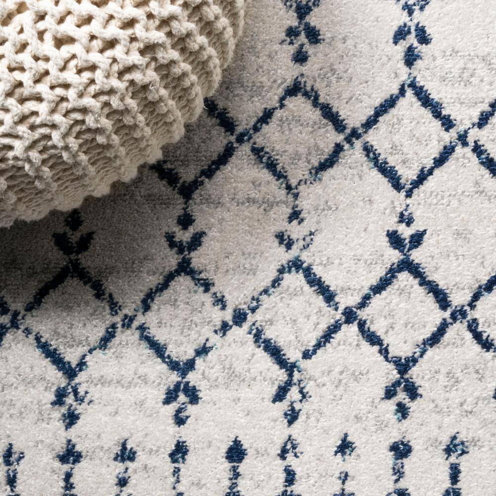 Ivory and Navy 4' x 6' Synthetic Trellis Area Rug