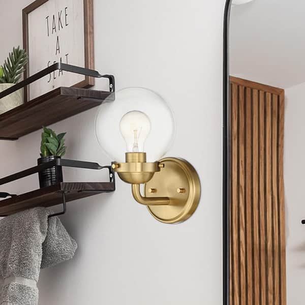 Knoll 5.75 in. 1-Light Brushed Gold Industrial Wall Sconce with Clear Glass Shade