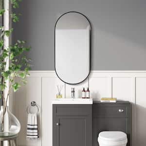 18 in. W x 35 in. H Oval Aluminum Framed Wall Bathroom Vanity Mirror in Black