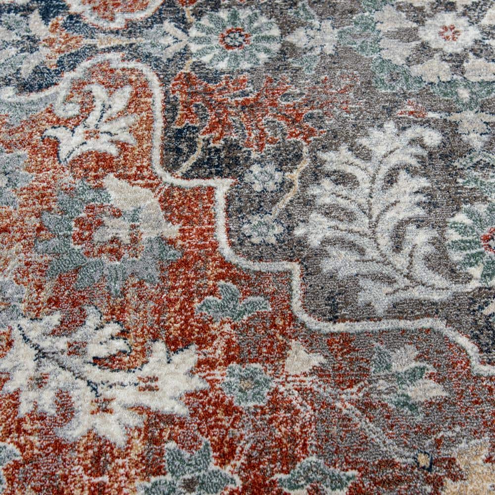 Blue and Taupe 2' x 3' Oriental Synthetic Area Rug