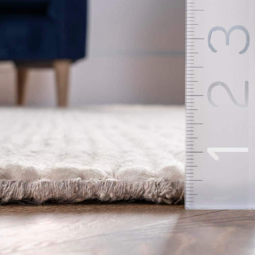 Handmade Off-White Braided Wool 4' x 6' Area Rug