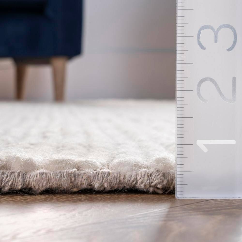Handmade Off-White Braided Wool 5' x 8' Area Rug
