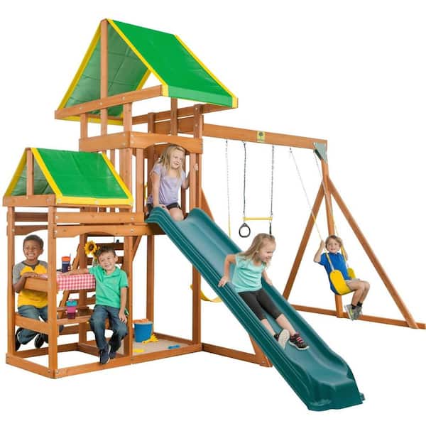 Creative Cedar Designs Woodlands Complete Wooden Swing Set with Rock Wall, Picnic Table, Slide and Playset