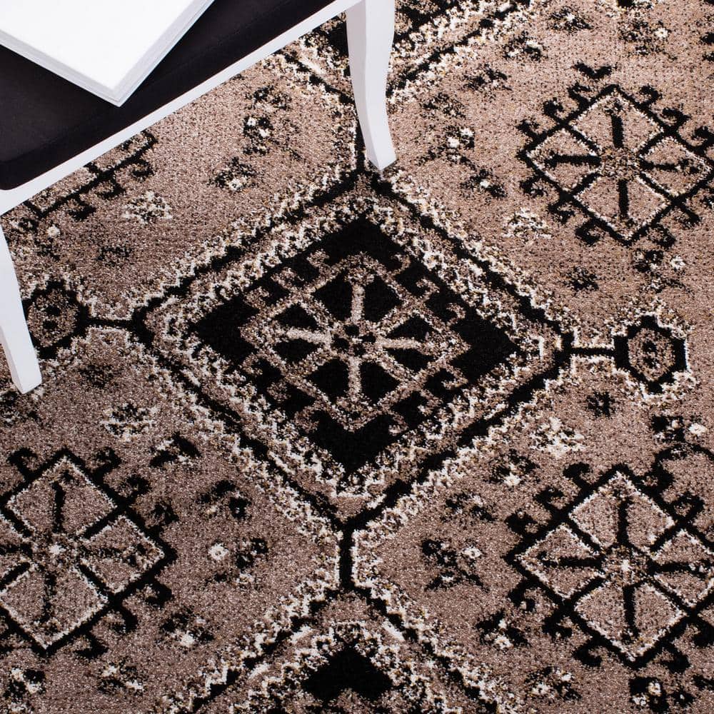 https://images.thdstatic.com/productImages/b34a8569-6572-4bc7-9001-0320b4b8092d/svn/brown-black-safavieh-area-rugs-vth293t-28-1f_1000.jpg